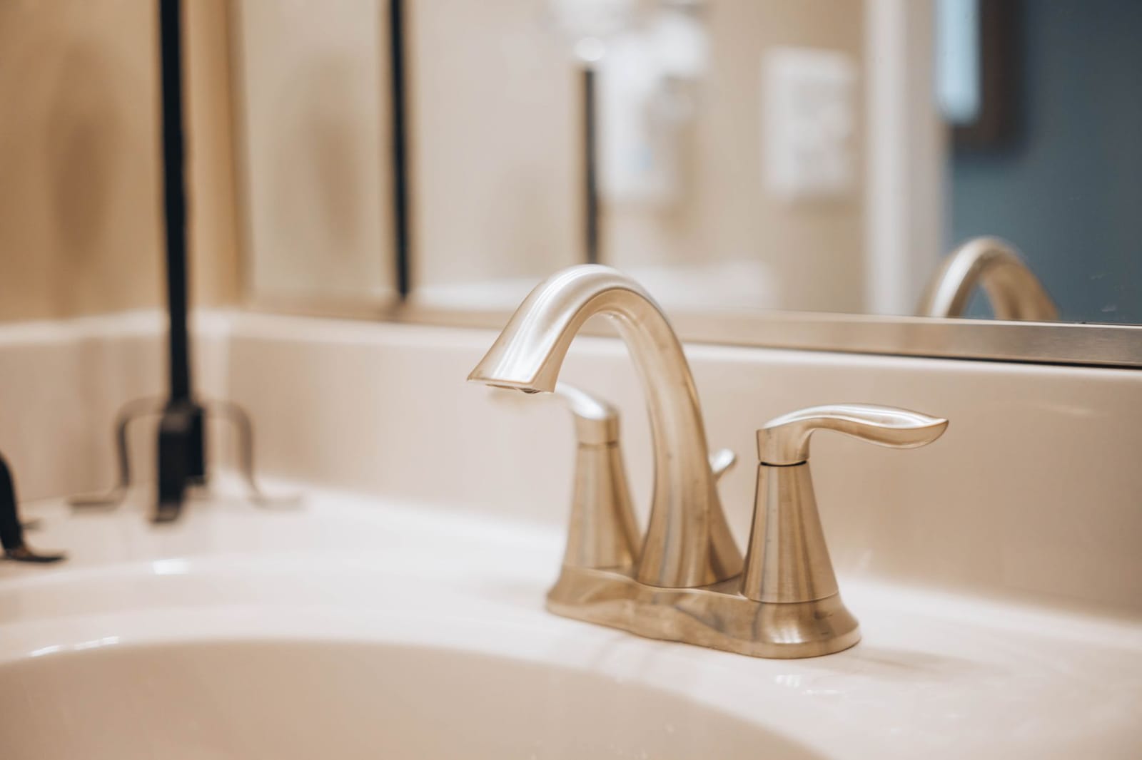 Water pooling in a clogged bathroom sink