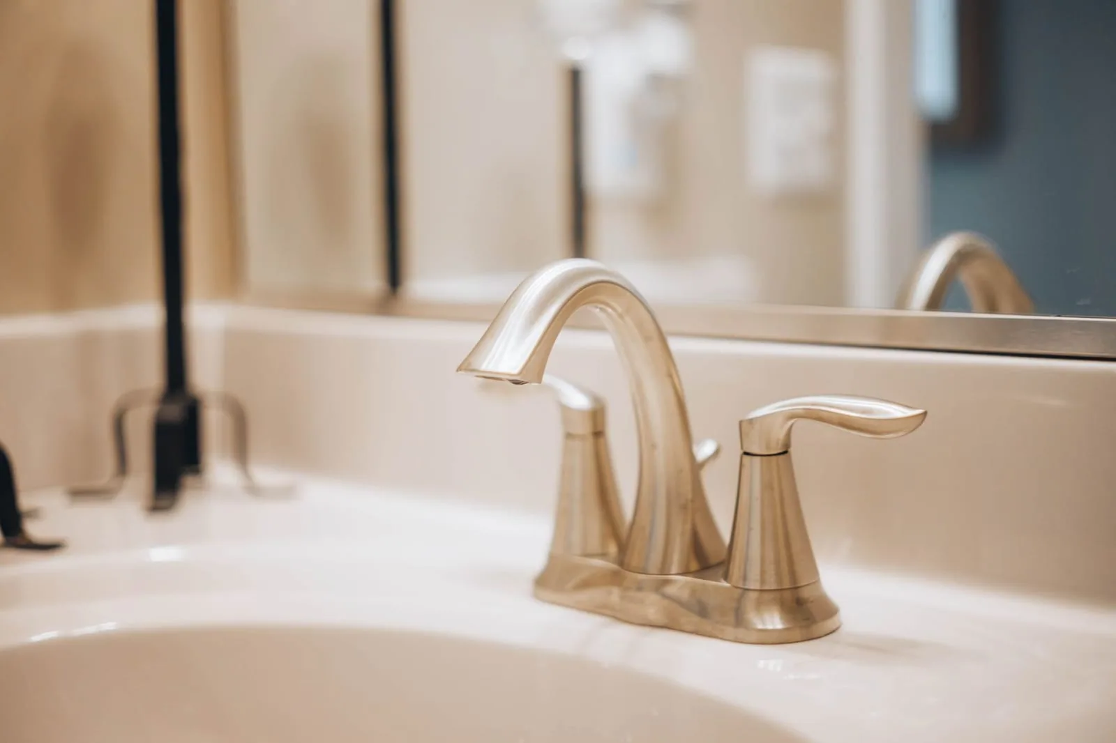 Water pooling in a clogged bathroom sink