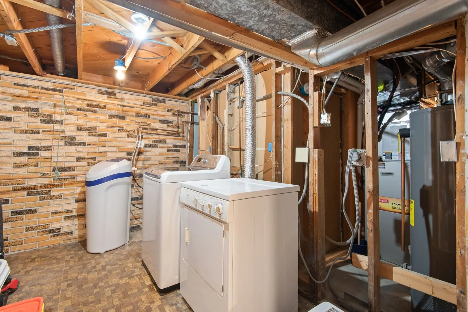 Water heater tank in a home basement
