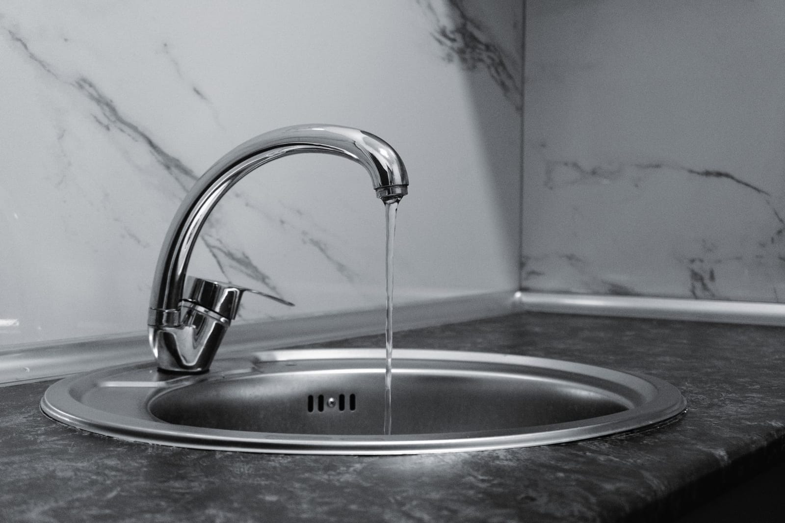Water draining slowly in a sink
