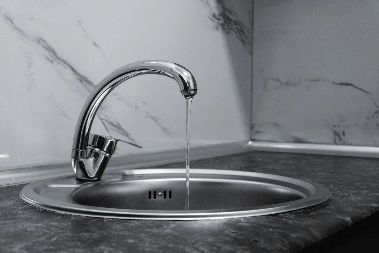 Water draining slowly in a sink