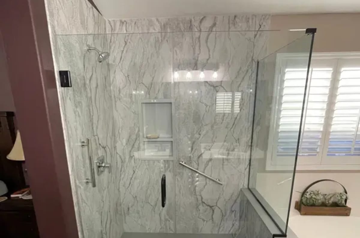 Shower running in a dimly lit bathroom during a power outage